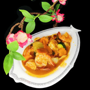 Scampis cocotte au basilic thaï et curry rouge